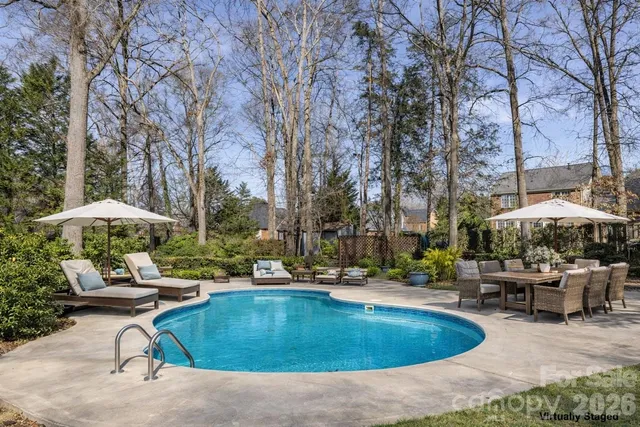 a bathroom with a shower and a bath tub