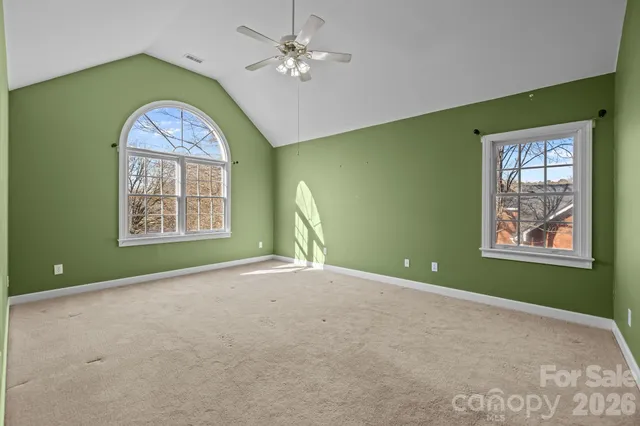 an empty room with windows