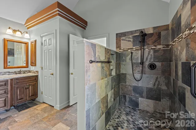 a view of a livingroom with furniture and windows