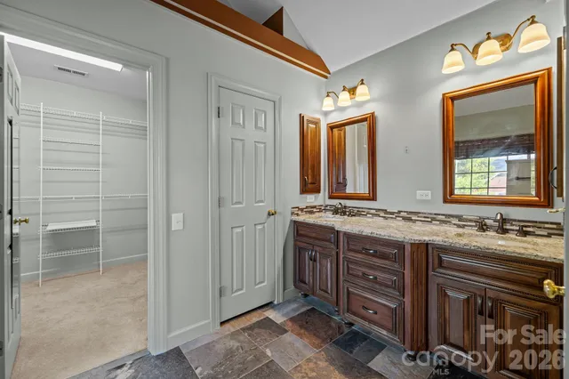 an empty room with a space and a window