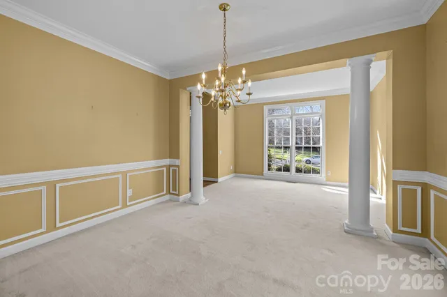 a kitchen with stainless steel appliances granite countertop a stove sink and cabinets