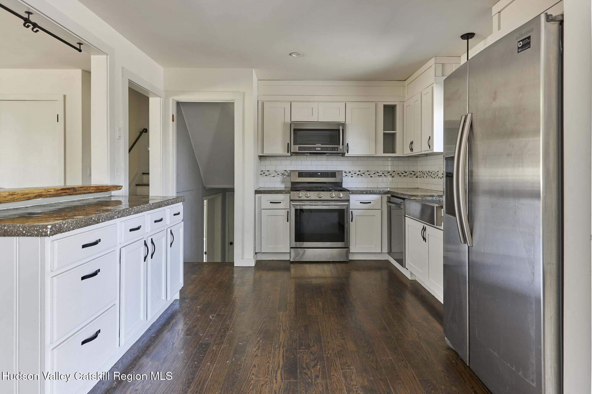 361 Allen Road Salt Point, NY 12578 - Photo 5 of 28 a kitchen with stainless steel appliances granite countertop a refrigerator stove and sink