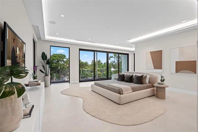 a bathroom with a tub shower and window