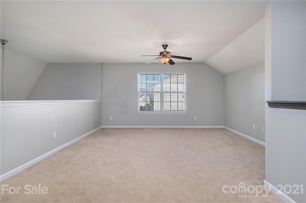 17107 Hampton Trace Road Huntersville, NC 28078 - Photo 15 of 18 a view of an empty room with a window