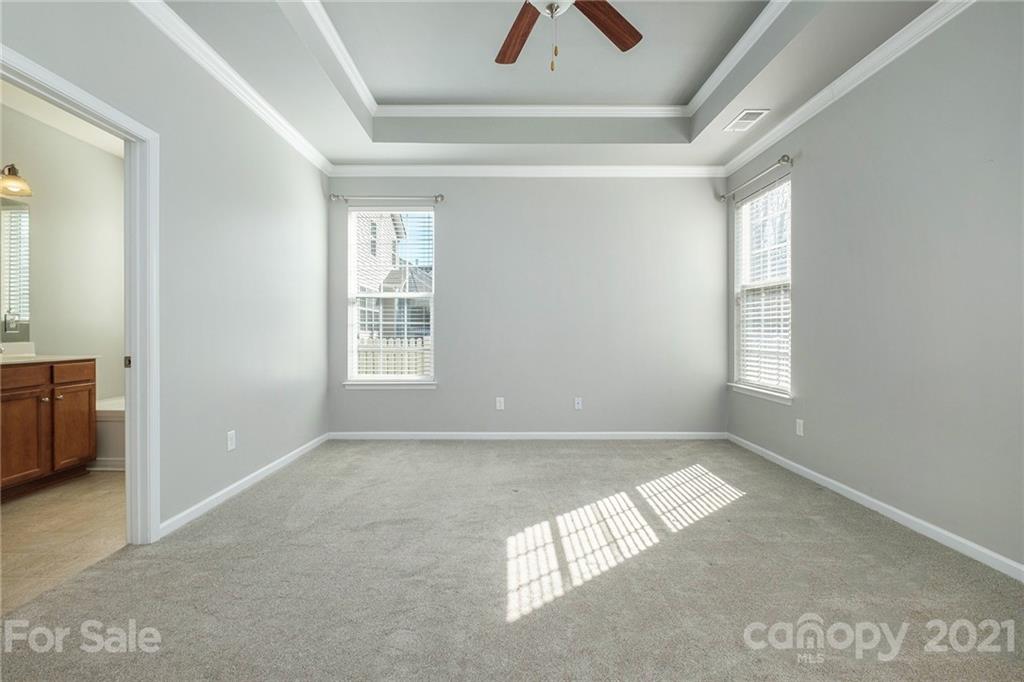 17107 Hampton Trace Road Huntersville, NC 28078 - Photo 4 of 18 an empty room with windows