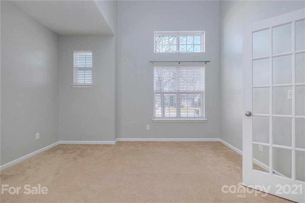 17107 Hampton Trace Road Huntersville, NC 28078 - Photo 8 of 18 an empty room with windows