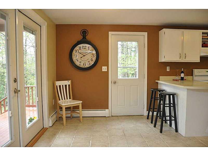 70 Country Club Road Hollis Center, ME 04042 - Photo 6 of 22 Kitchen. French doors open out onto...