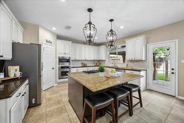 $550,000 | 9122 Memorial Valley Drive, Spring, TX 77379