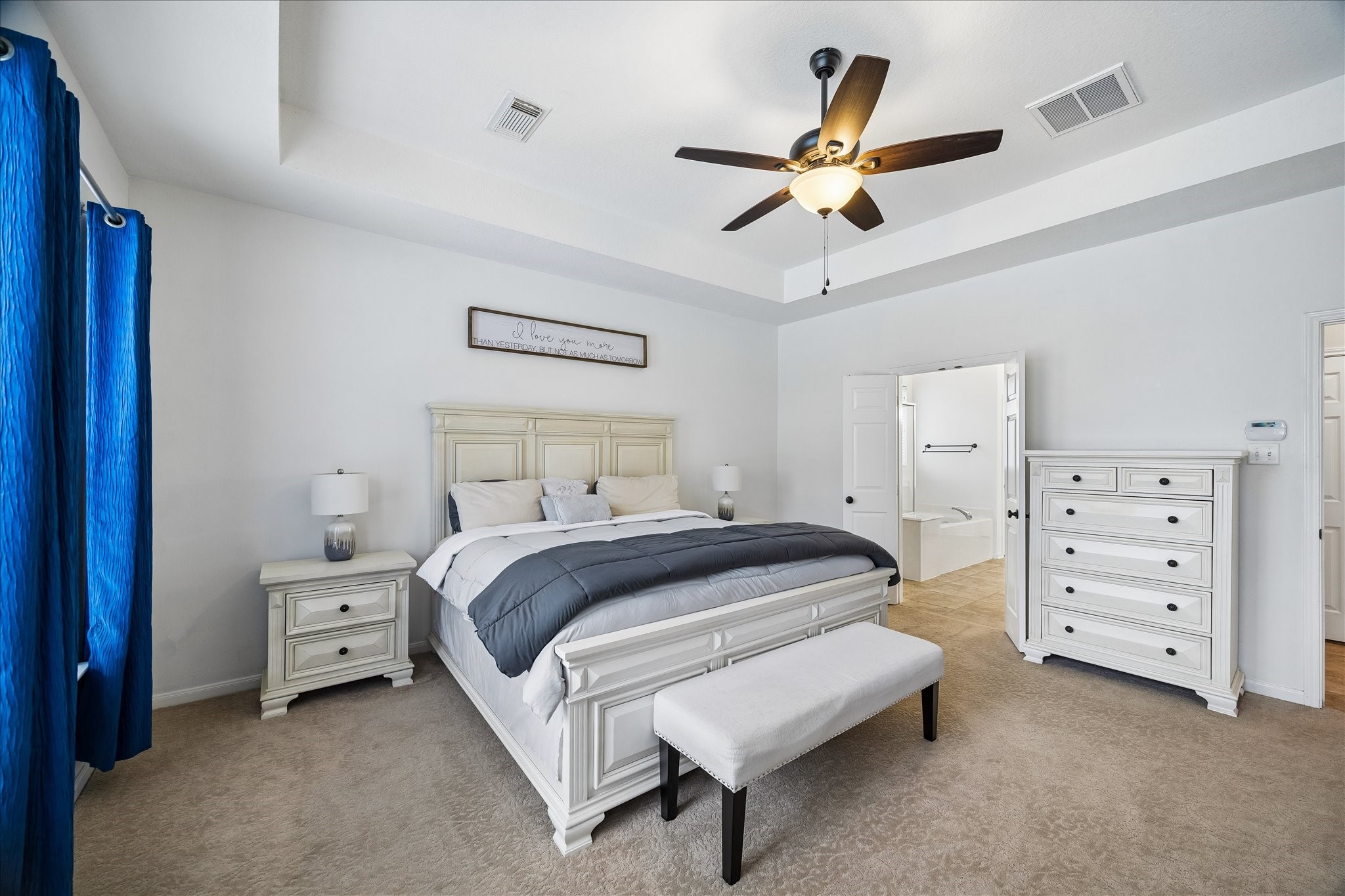 9122 Memorial Valley Drive Spring, TX 77379 - Photo 16 of 35 a bedroom with a bed and ceiling fan