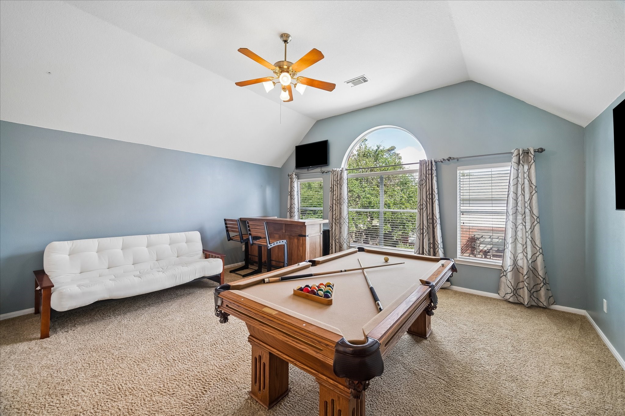 9122 Memorial Valley Drive Spring, TX 77379 - Photo 22 of 35 a living room with furniture and a large window