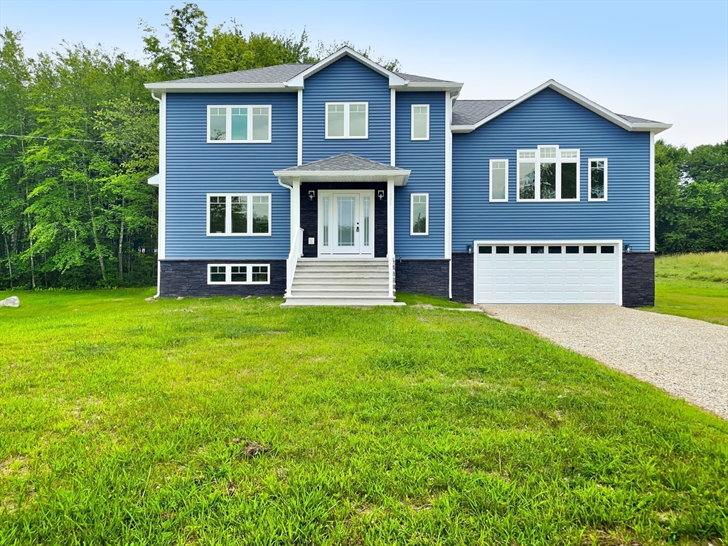 101 N Road Westfield, MA 01085 - Photo 1 of 40 a front view of a house with garden