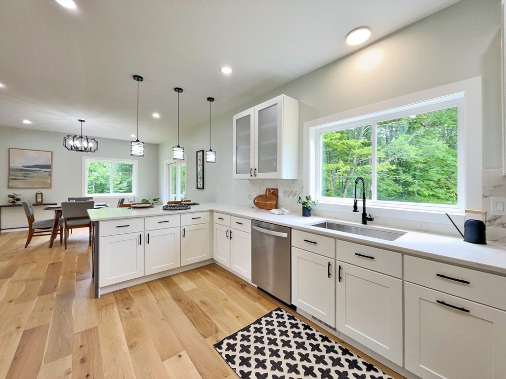 101 N Road Westfield, MA 01085 - Photo 14 of 40 a kitchen with a sink cabinets and window