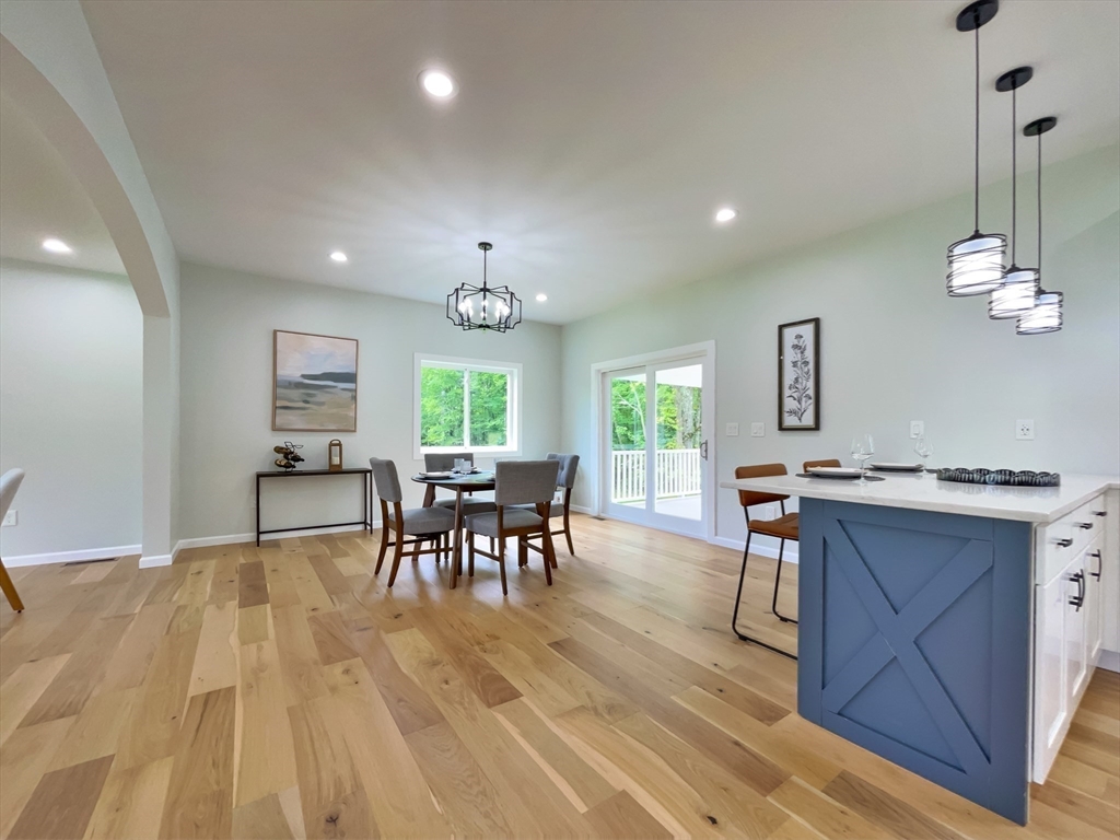 101 N Road Westfield, MA 01085 - Photo 17 of 40 a view of a dining room with furniture window and wooden floor