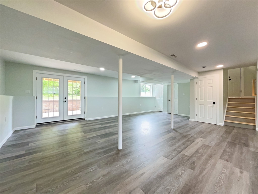 101 N Road Westfield, MA 01085 - Photo 34 of 40 an empty room with wooden floor and windows