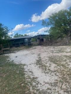 105 Concho Street, Unit A Tye, TX 79563 - Photo 6 of 8 a view of house with backyard