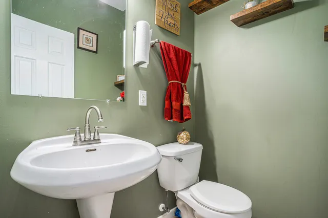 a bathroom with a sink and a toilet