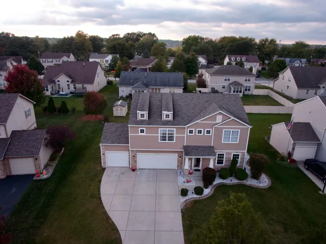 an aerial view of a house with a garden