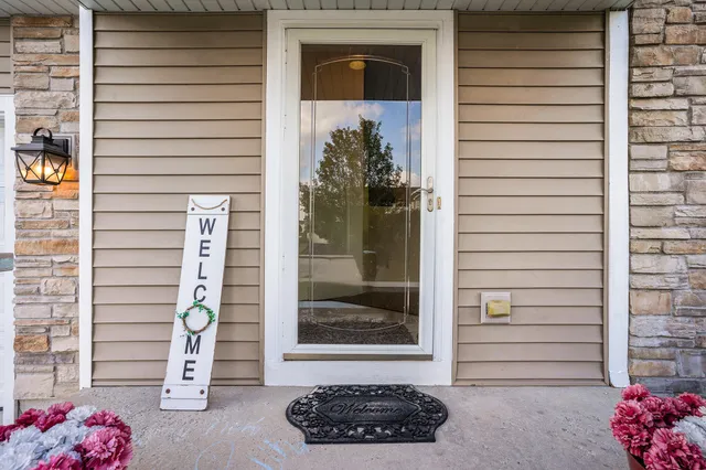 a view of a entryway door front of house