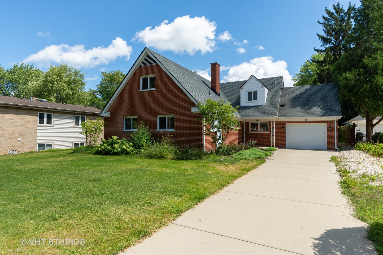 403 North Plum Grove Road Palatine, IL 60067 - Photo 1 of 11 a front view of a house with garden