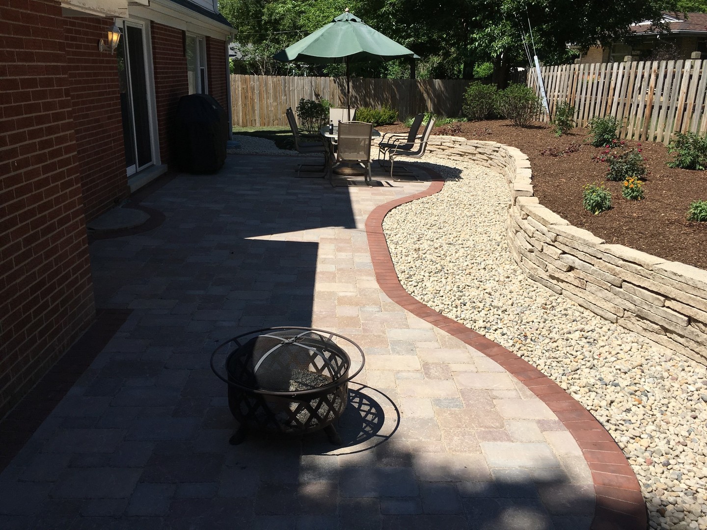 403 North Plum Grove Road Palatine, IL 60067 - Photo 11 of 11 a view of a backyard with table and chairs