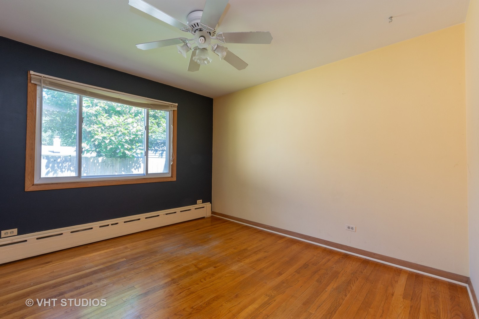 403 North Plum Grove Road Palatine, IL 60067 - Photo 7 of 11 a view of an empty room with a window