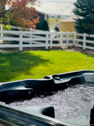 a view of swimming pool from a yard
