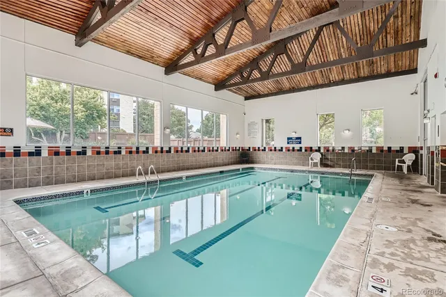 a view of a swimming pool with a large pool