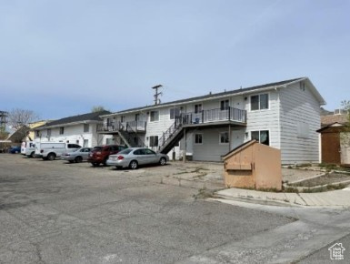 590 Pilot Avenue Wendover, UT 84083 - Photo 1 of 20 View of property featuring stairway and uncovered parking