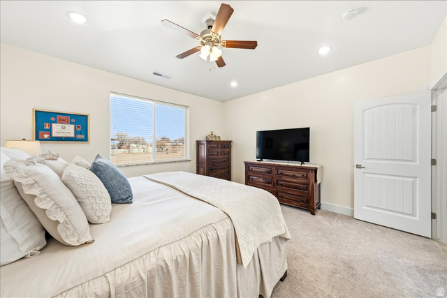 357 East Main Street Enterprise, UT 84725 - Photo 26 of 71 Bedroom featuring light colored carpet, ceiling fan, and recessed lighting