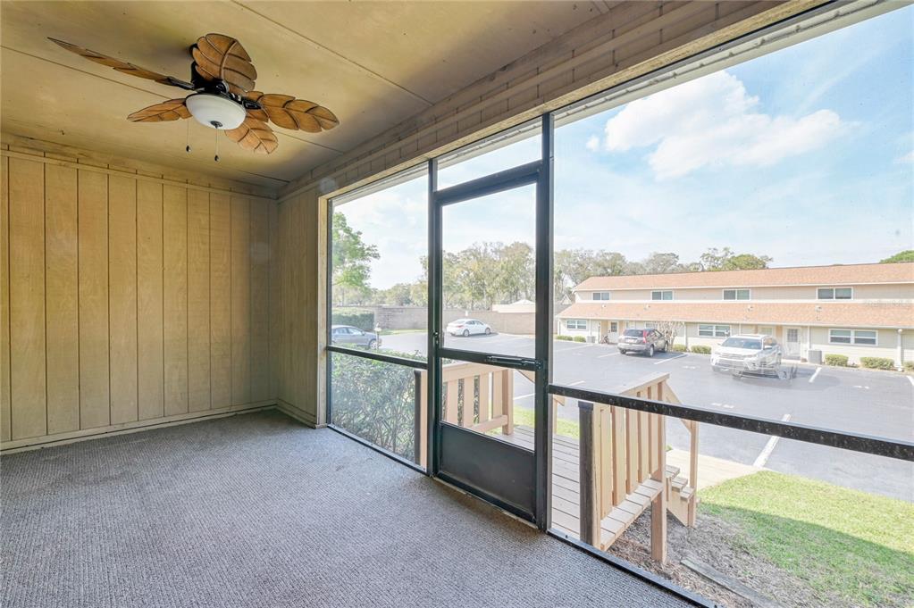 11001 Southeast Sunset Harbor Road, Unit H52 Summerfield, FL 34491 - Photo 6 of 31 a view of an empty room and window