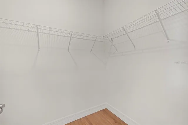 a view of a room with racks on the wall