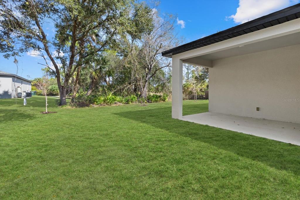 5670 Gilroy Avenue North Port, FL 34288 - Photo 5 of 28 a view of a house with a yard