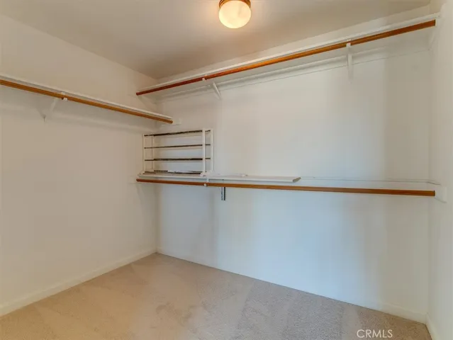 a view of a room with racks on the wall