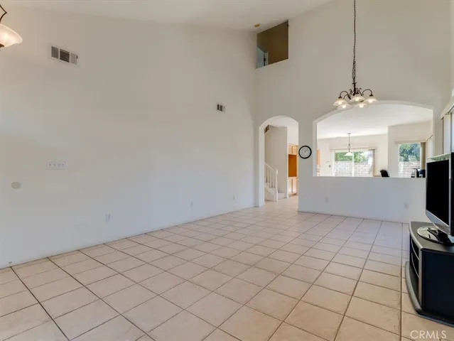 a view of a room with a chandelier