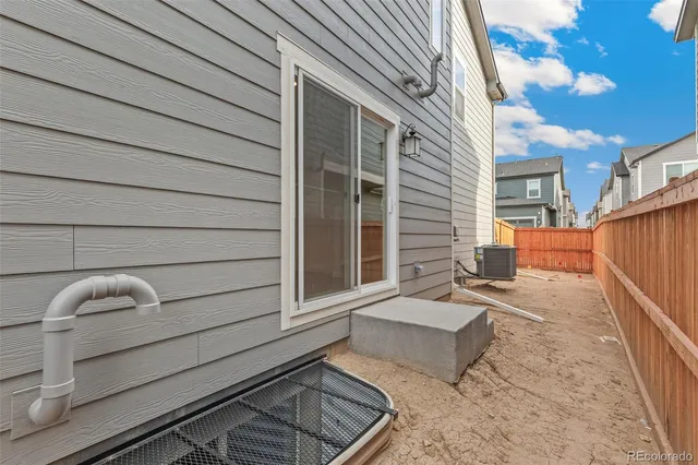 a backyard of a house with seating space