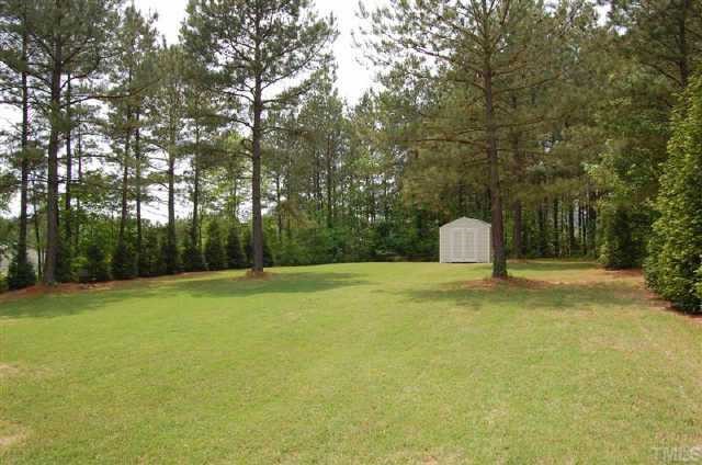 587 Blue Pond Road Clayton, NC 27520 - Photo 10 of 11 One acre of paradise!! Room to breathe!! This home is perfect for those who love the outdoors, with a little piece of heaven to call your own.