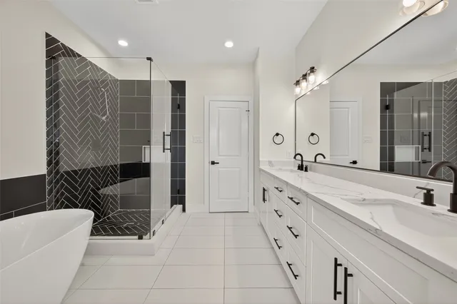 a bathroom with a double vanity sink and a mirror