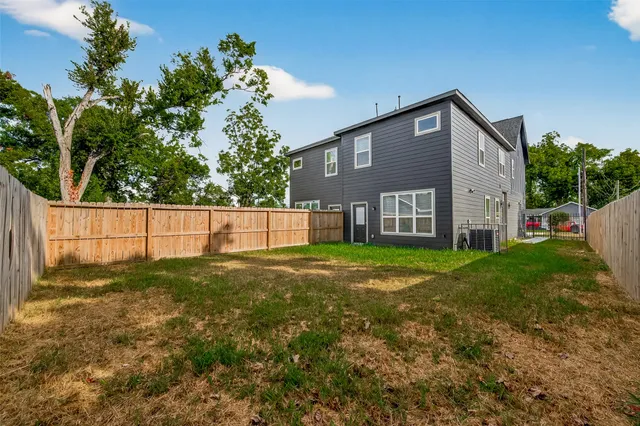 a view of backyard with green space