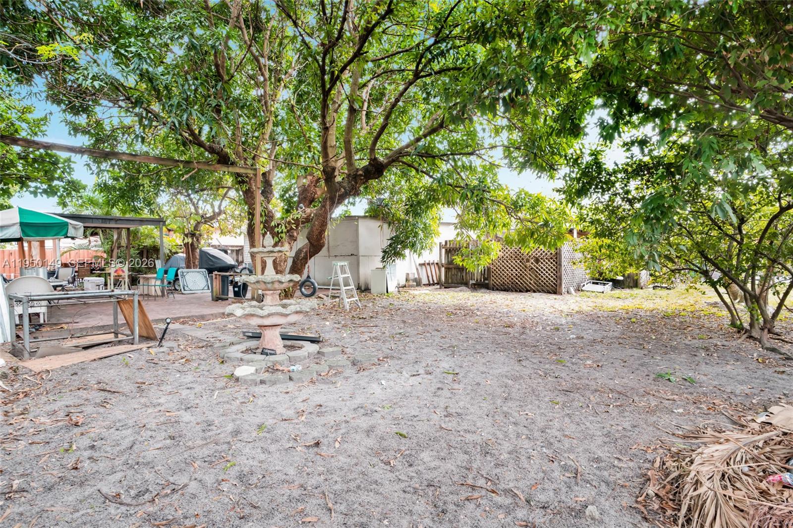 5955 Southwest 4th Street Miami, FL 33144 - Photo 16 of 18 a view of road with large trees