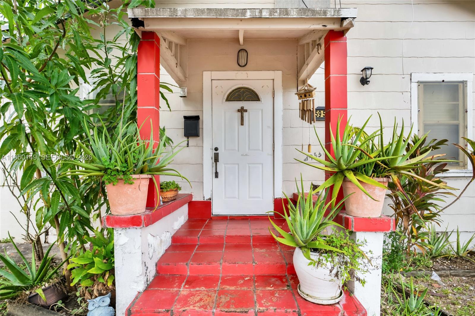 5955 Southwest 4th Street Miami, FL 33144 - Photo 3 of 18 a front view of a house