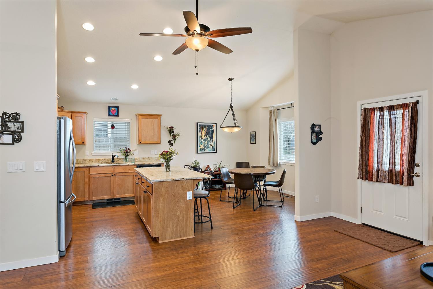 126 Suncrest Road Talent, OR 97540 - Photo 4 of 25 Hardwood laminate floors throughout livi