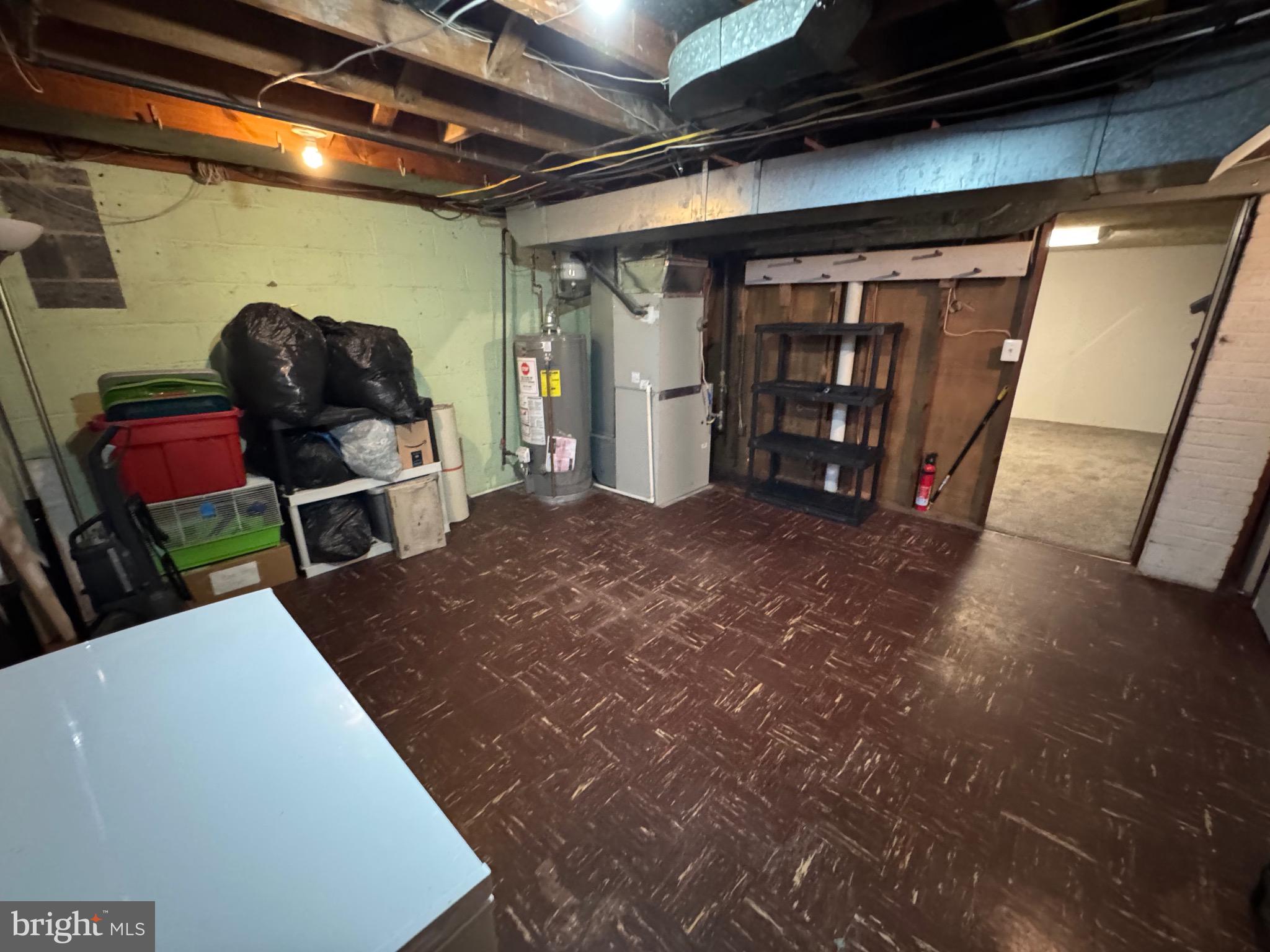 1052 Downton Road Baltimore, MD 21227 - Photo 35 of 55 a view of a hallway with wooden floor