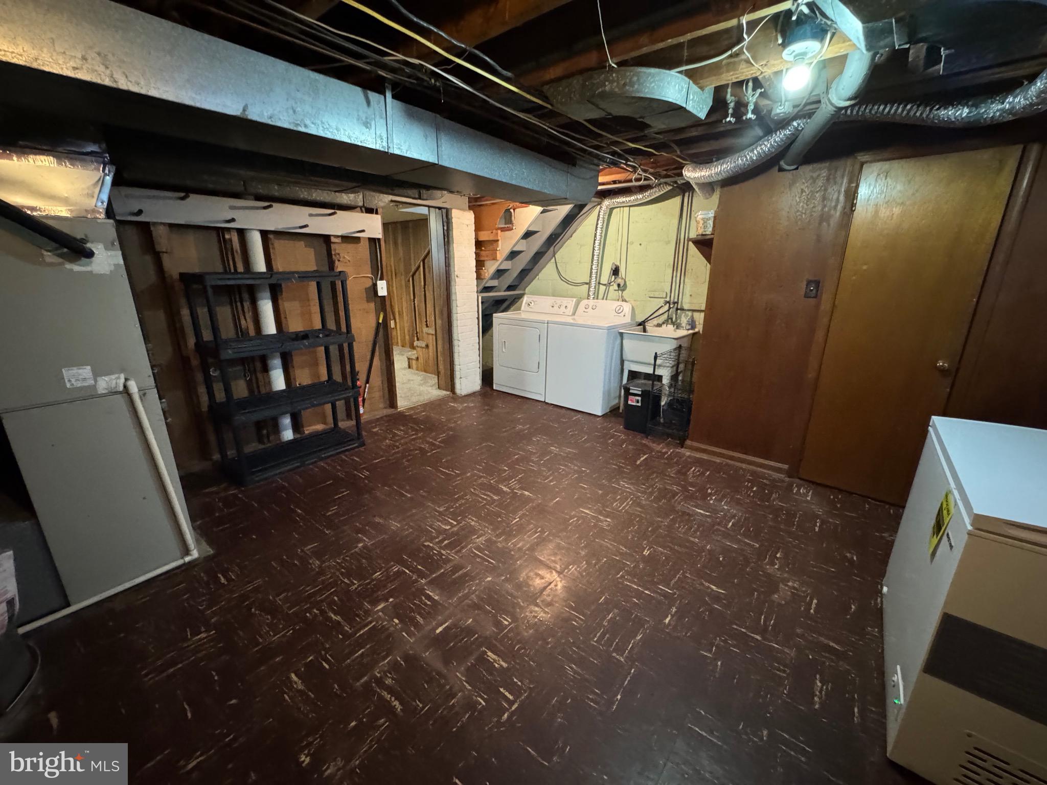 1052 Downton Road Baltimore, MD 21227 - Photo 36 of 55 a view of empty room with wooden floor