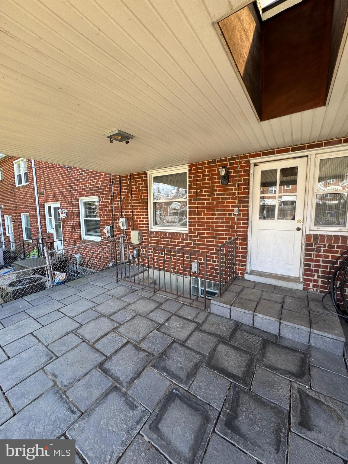 1052 Downton Road Baltimore, MD 21227 - Photo 38 of 55 a front view of a house with chairs
