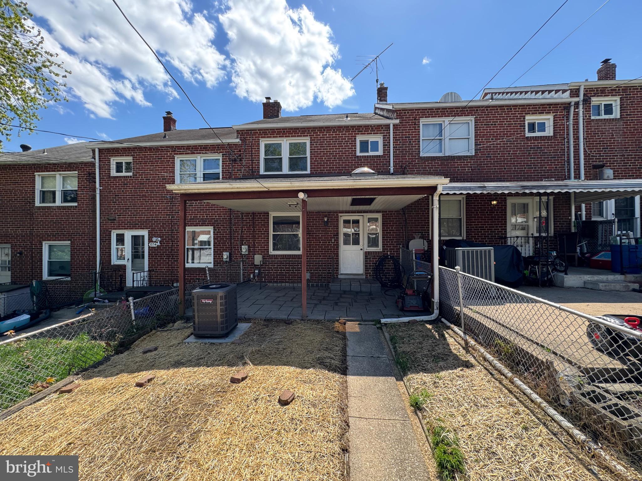 1052 Downton Road Baltimore, MD 21227 - Photo 41 of 55 a view of a house with a yard