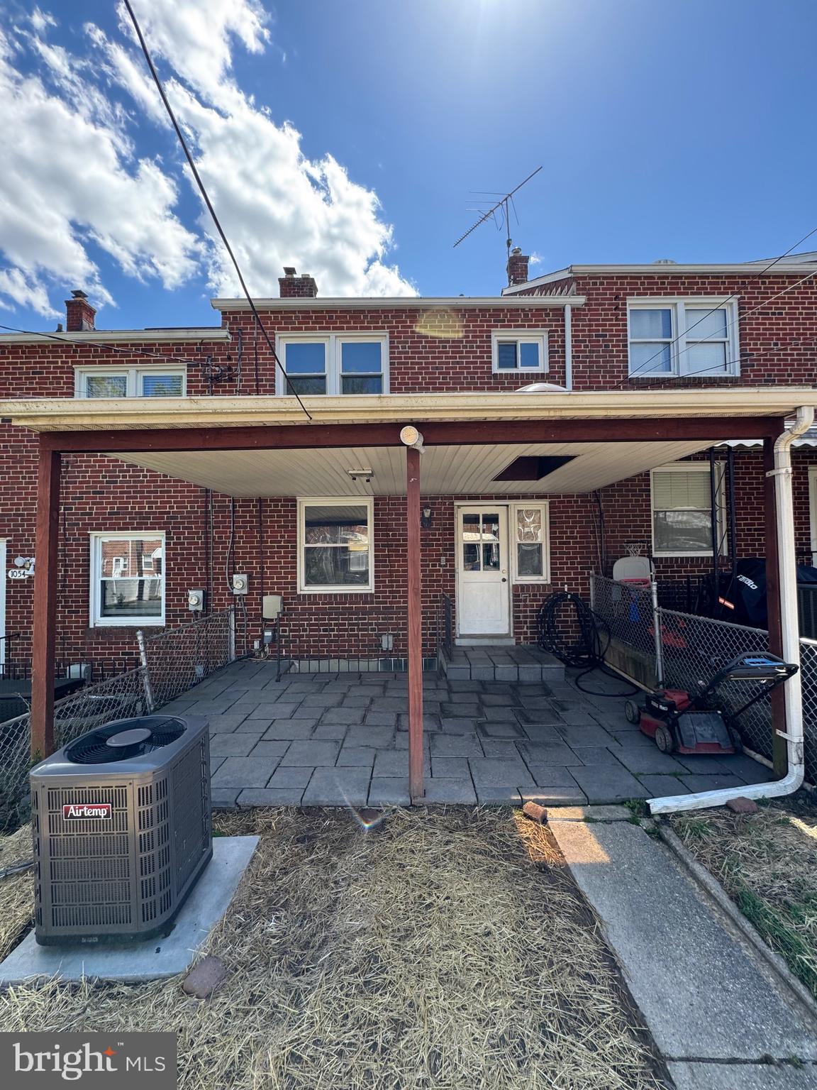 1052 Downton Road Baltimore, MD 21227 - Photo 42 of 55 front view of a building with many windows