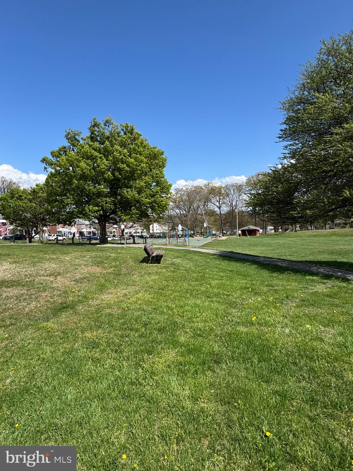 1052 Downton Road Baltimore, MD 21227 - Photo 55 of 55 a view of a green field with wooden fence