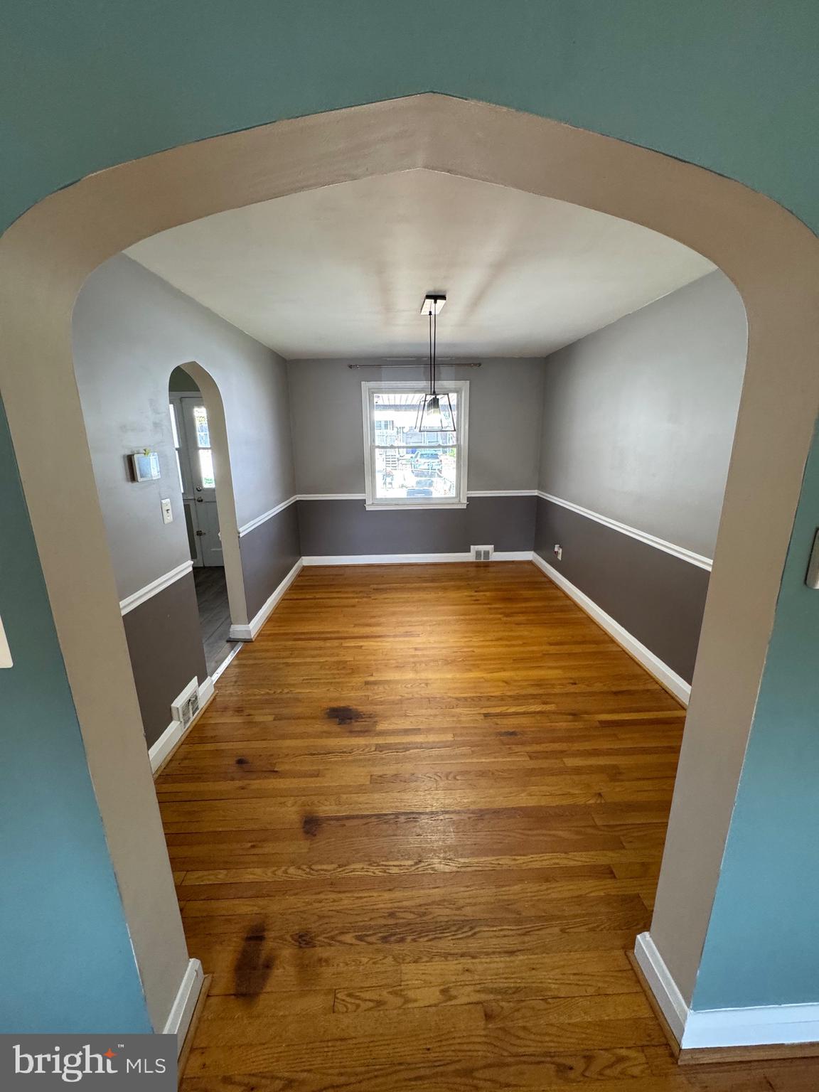 1052 Downton Road Baltimore, MD 21227 - Photo 7 of 55 a view of a kitchen with a sink and window