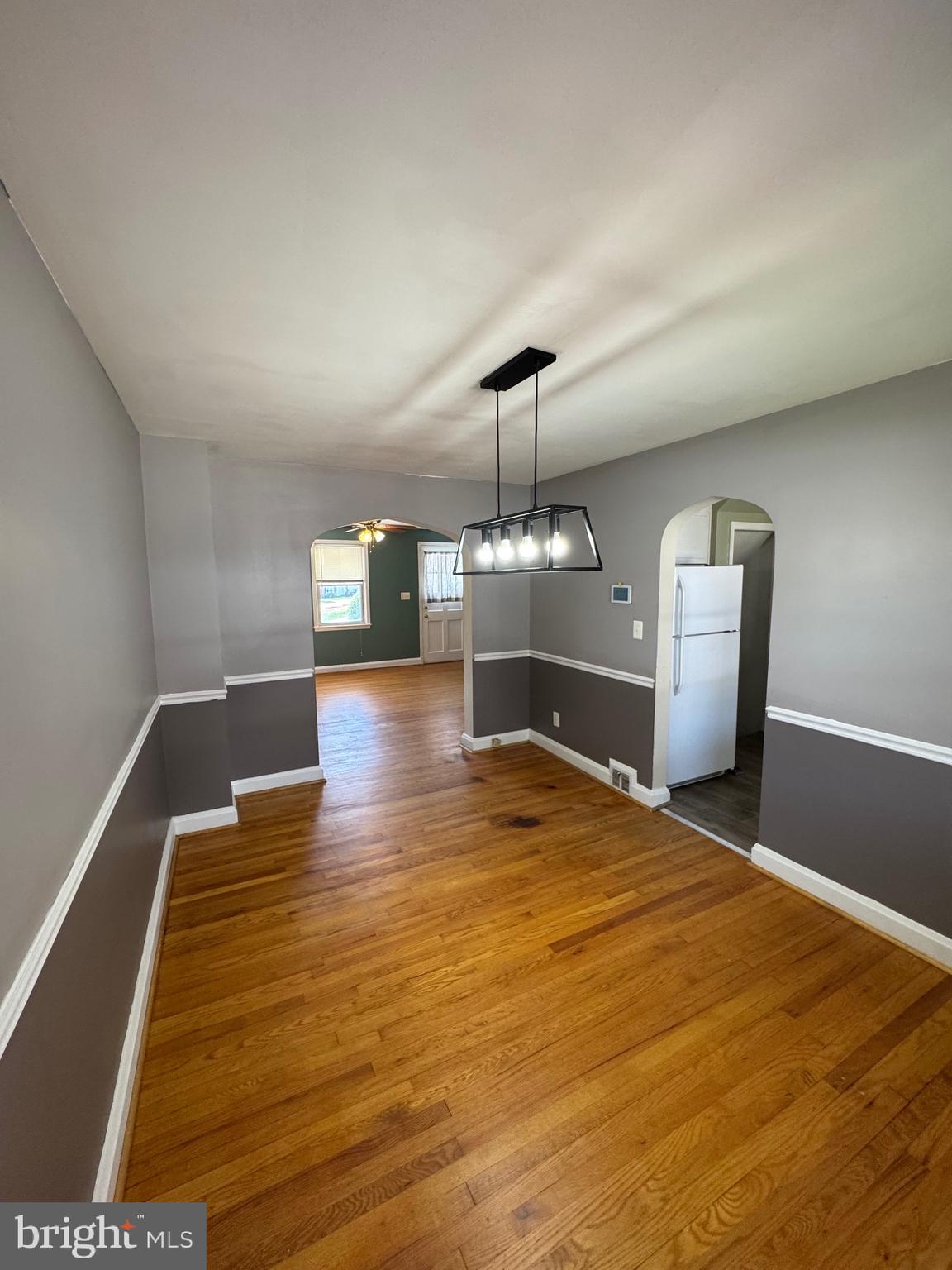 1052 Downton Road Baltimore, MD 21227 - Photo 9 of 55 a view of a room with wooden floor