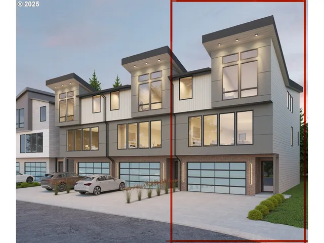 a front view of a residential apartment building with a yard